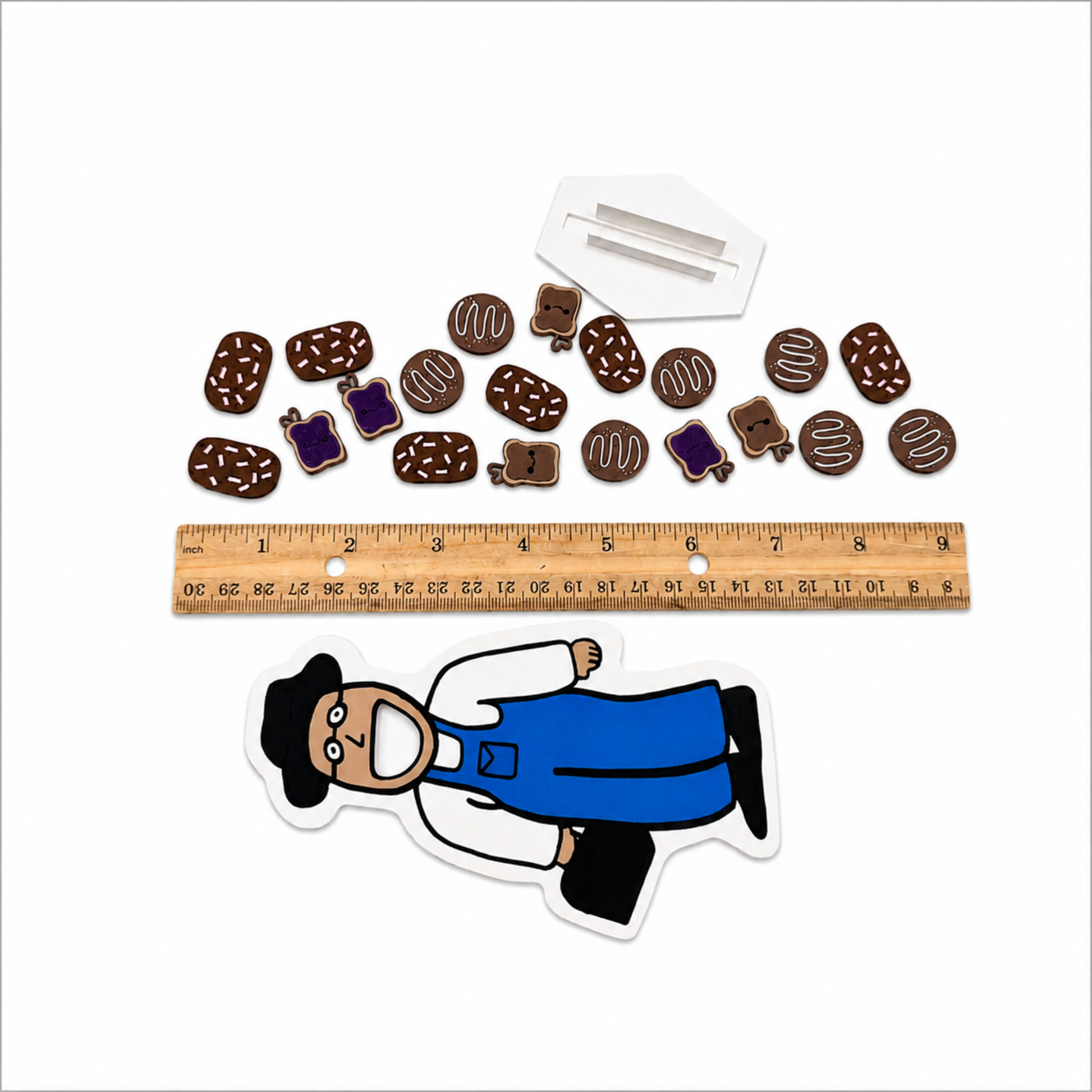 Feed the Friendly Neighbor speech therapy game shown with ruler for accurate miniature size reference and product measurements
