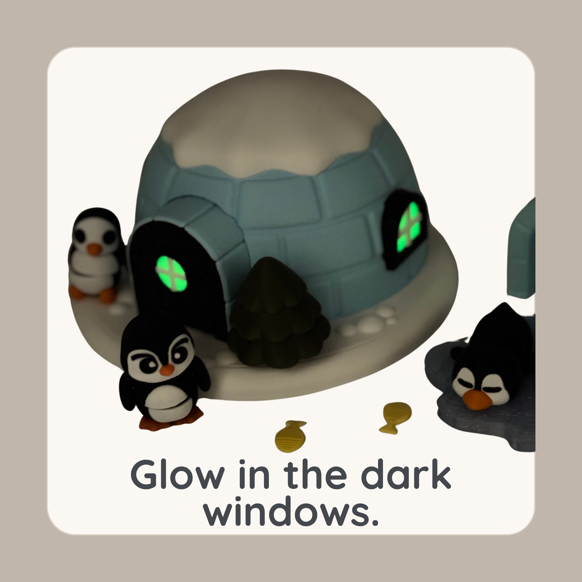 Penguin igloo play set with glow in the dark window feature in low light setting