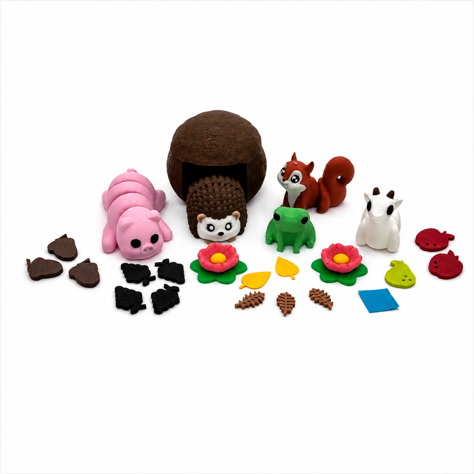 Complete Hedgehog and Friends miniature set showing woodland animals, hut, flowers, leaves, fruit, acorns, and storytelling accessories.