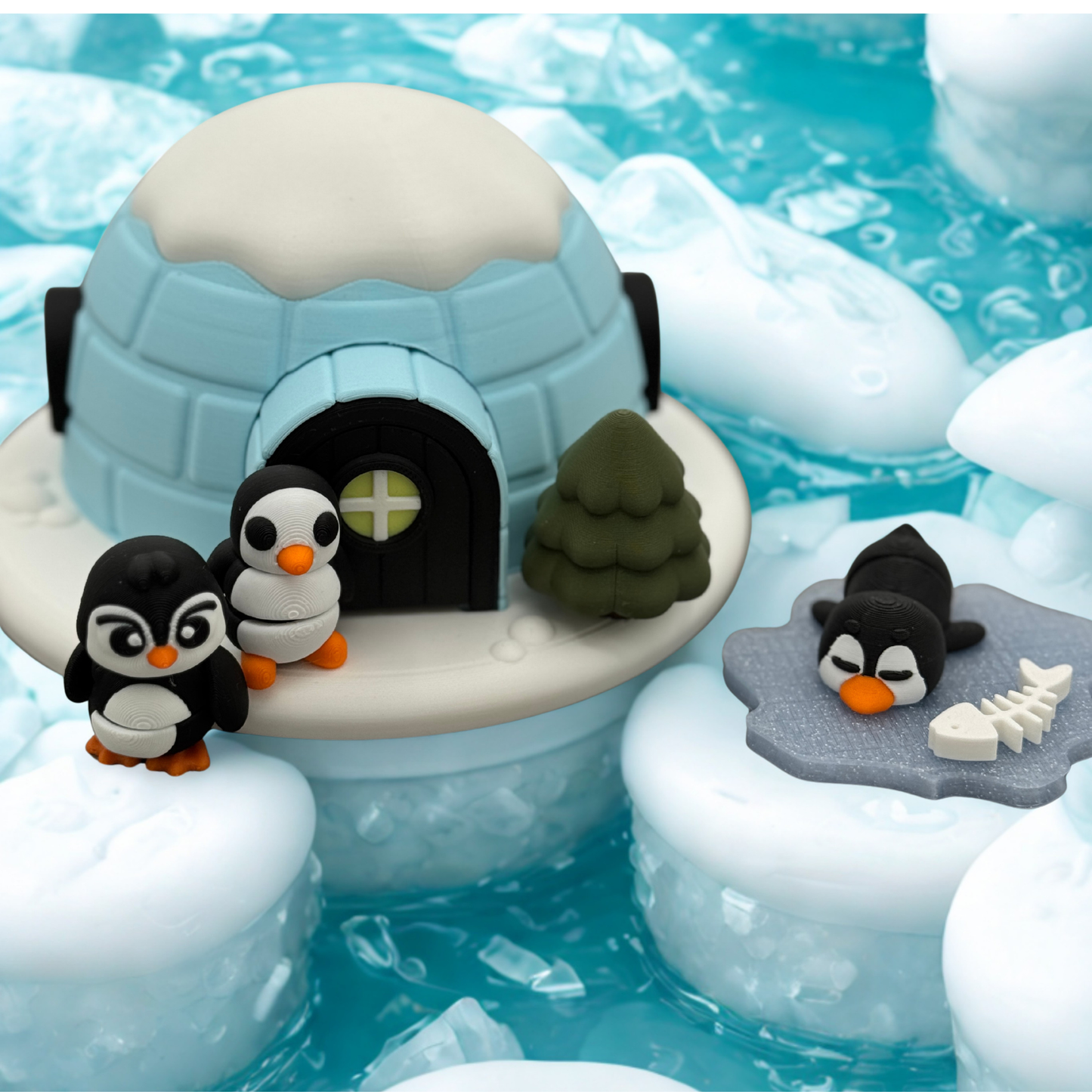 Penguin igloo play set displayed in icy sensory play environment with floating ice background