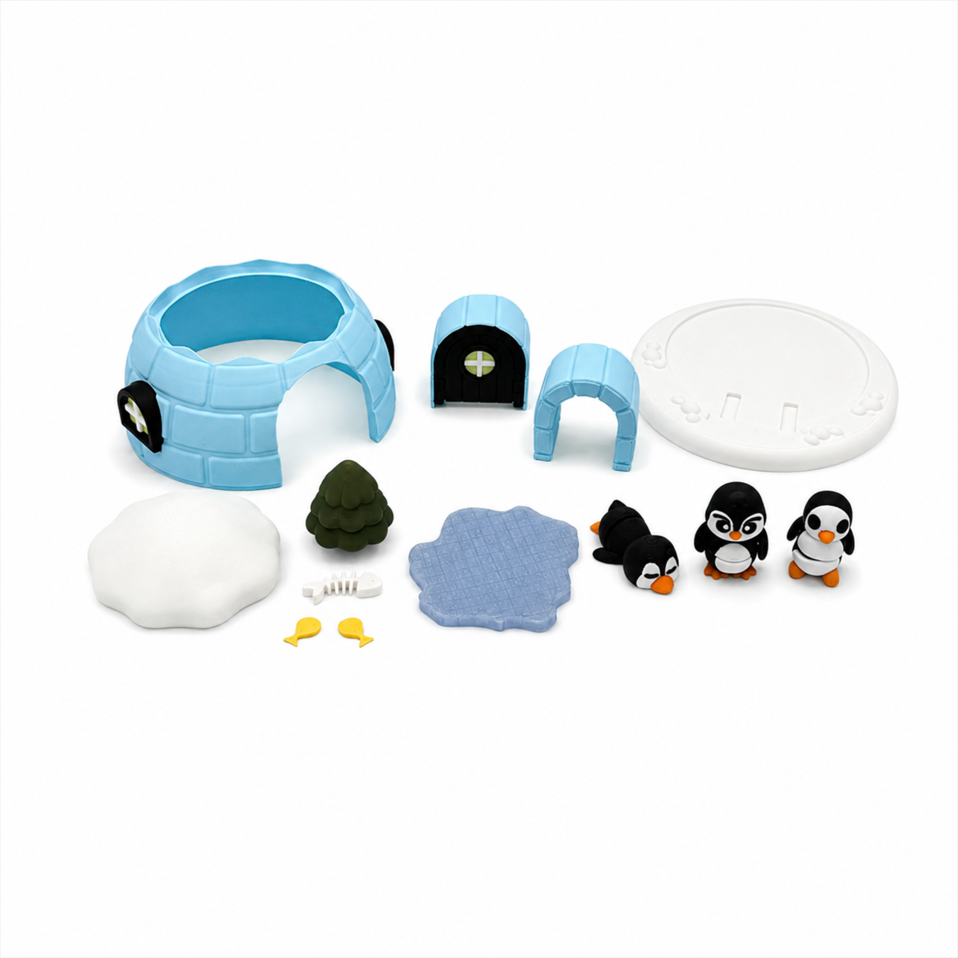 Everything included in the Penguin & Igloo Winter Play Set with miniature igloo, penguins, ice, tree, fish, snow pieces, and winter accessories for imaginative learning.