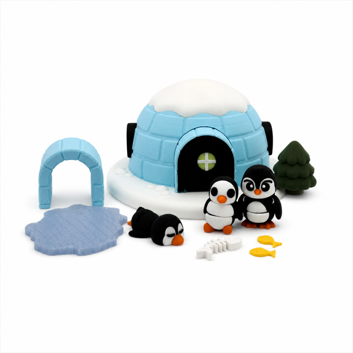 Penguin & Igloo Winter Play Set featuring a miniature igloo, three penguins, evergreen tree, fish, and ice accessories for sensory bins, pretend play, homeschool, and speech therapy.