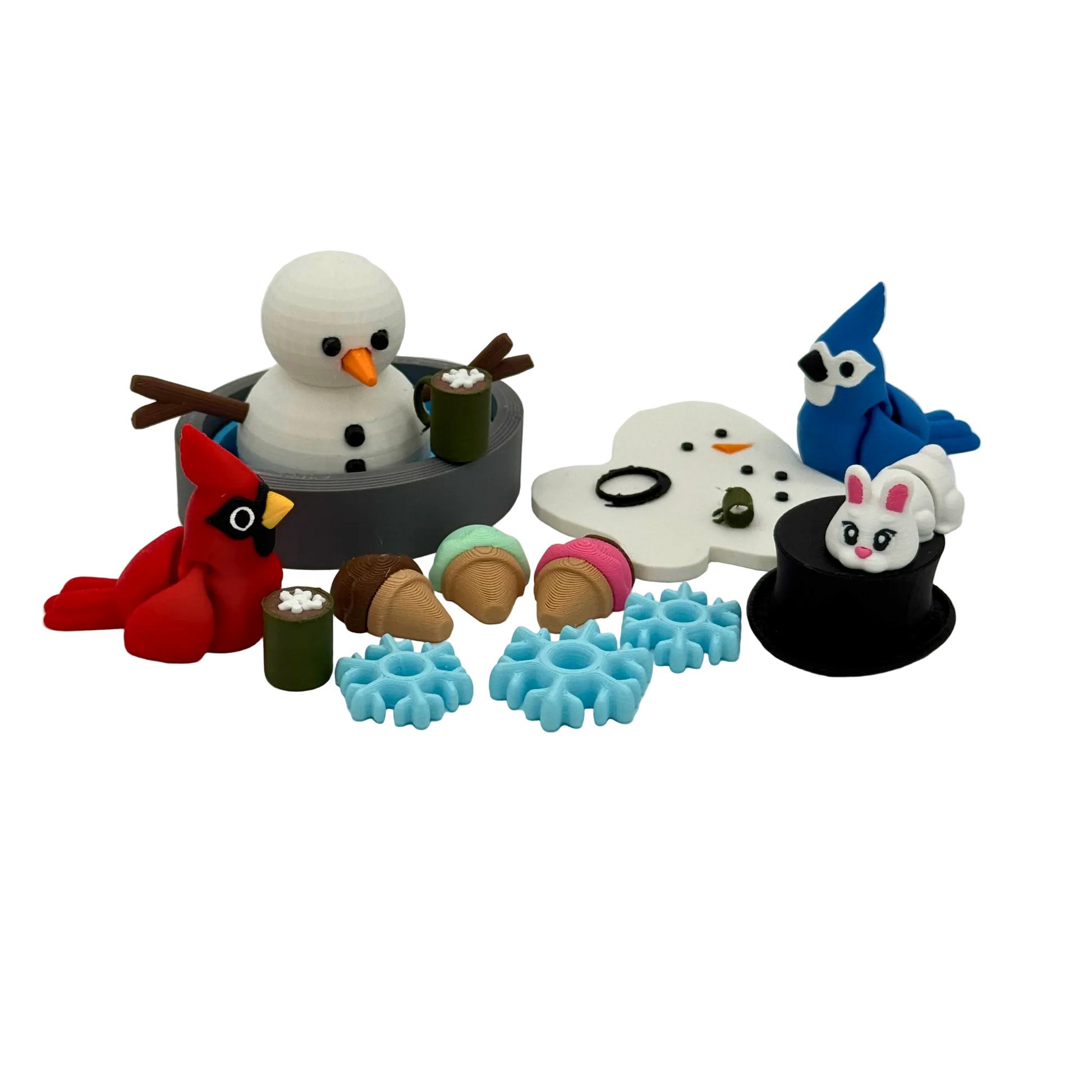All pieces included in the winter storybook character set laid out to show individual 3D printed figures and play props