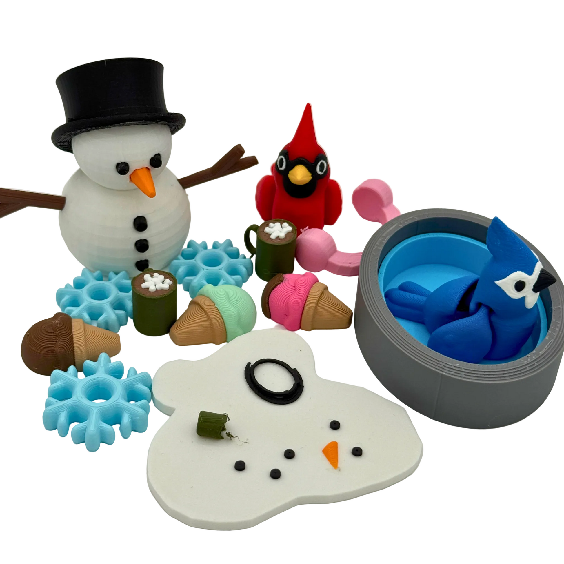 Snowman and animal character miniatures from a winter storybook play set displayed together to show included figures and accessories