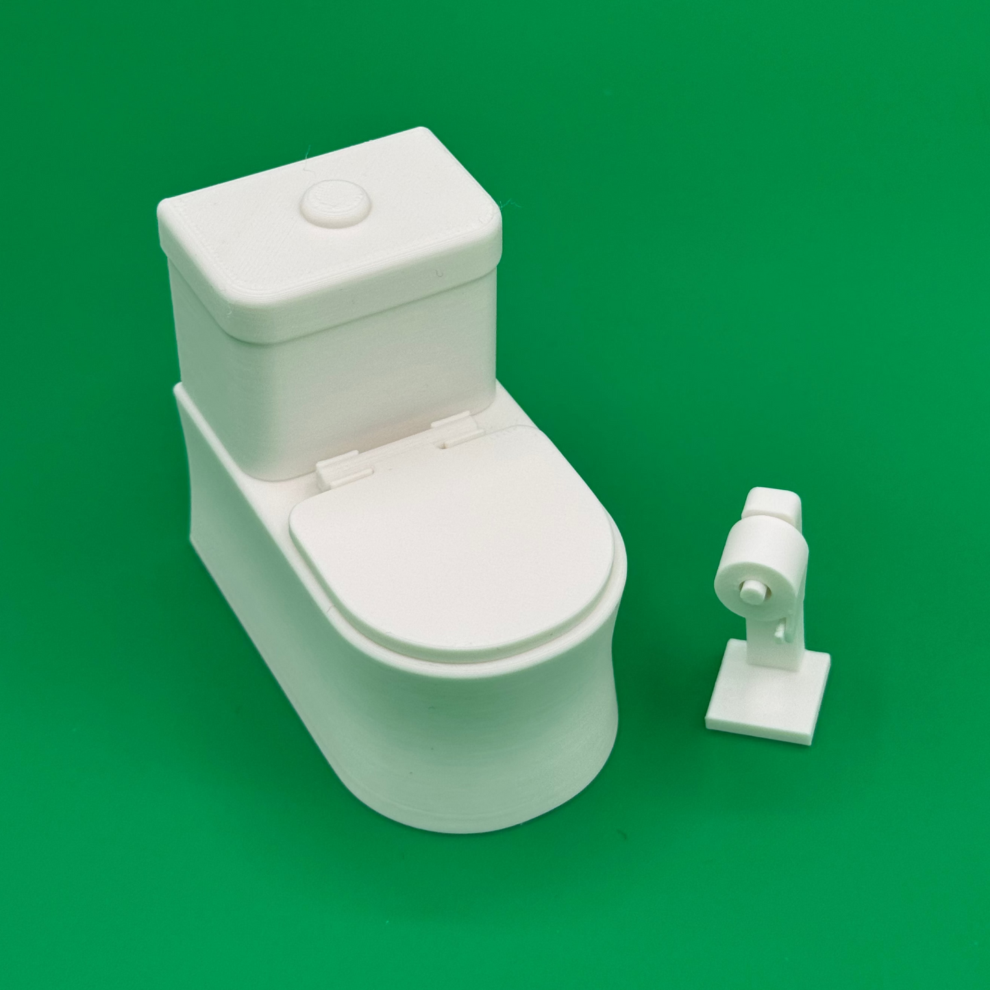 Closeup view of miniature toilet