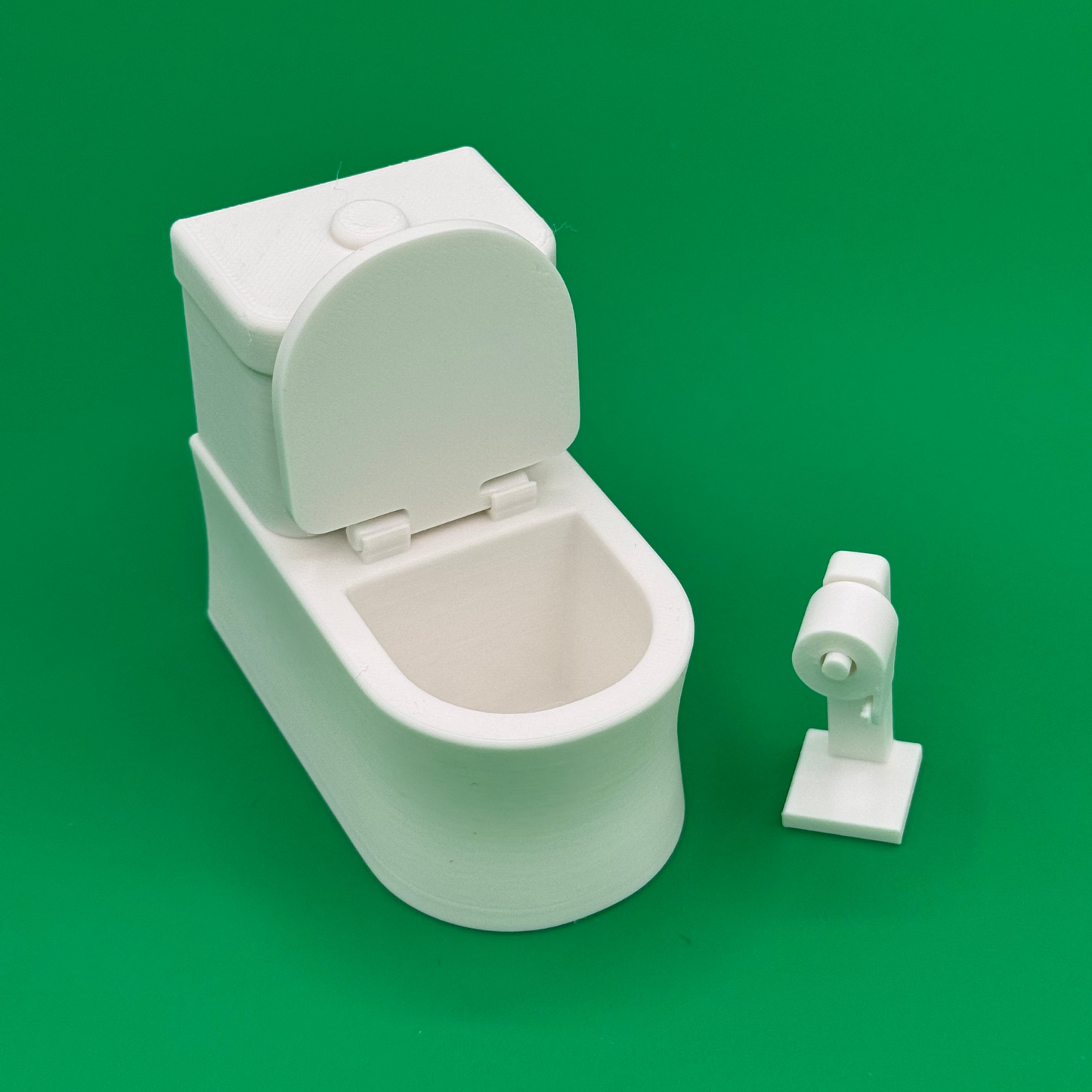 Toilet accessory with lid open