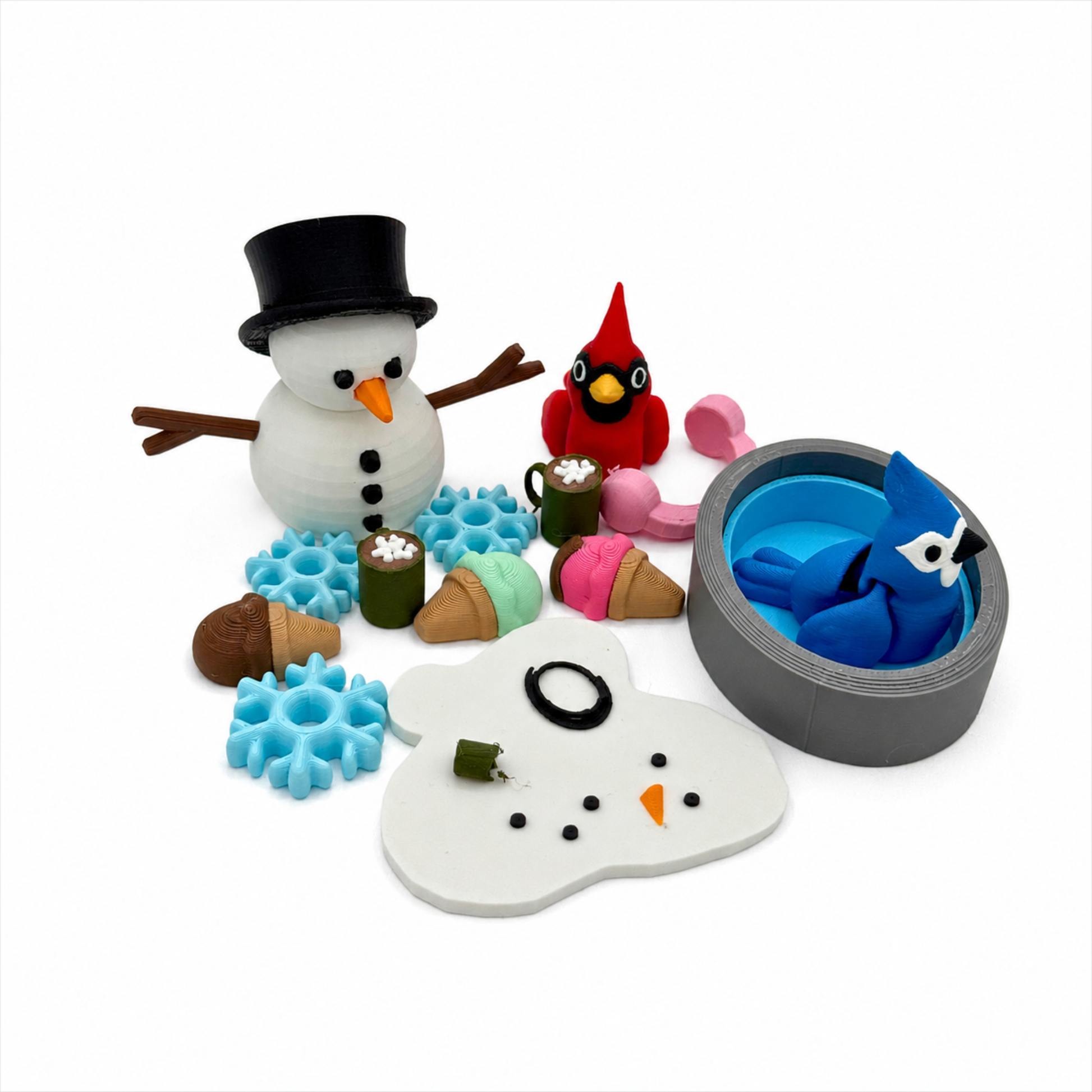 Winter snowman sensory play set with cardinal, blue jay, bunny, snowflakes, hot cocoa mugs, and snowman face for storybook activities, speech therapy, homeschool, and small world play.
