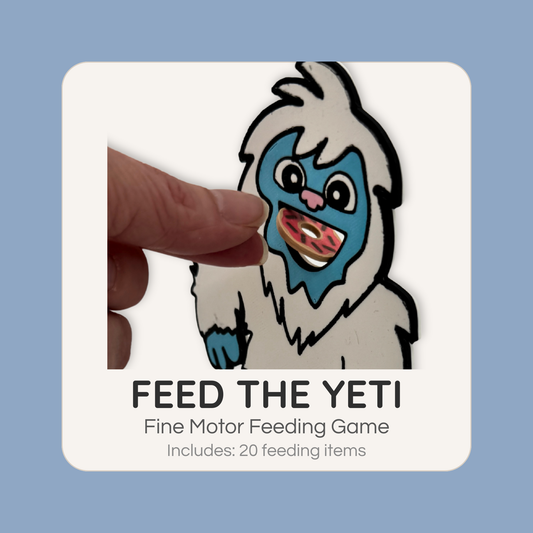 Feed the Yeti fine motor feeding game with child placing treat into yeti mouth for interactive play