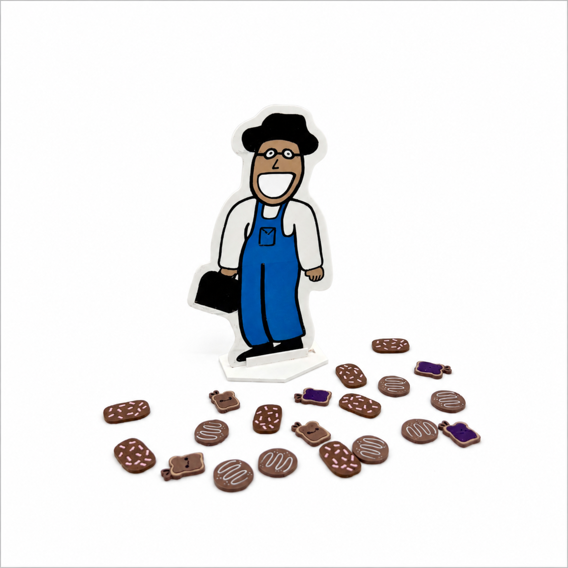 Feed the Friendly Neighbor speech therapy game including 3D printed character stand and miniature Valentine  pieces on a white background