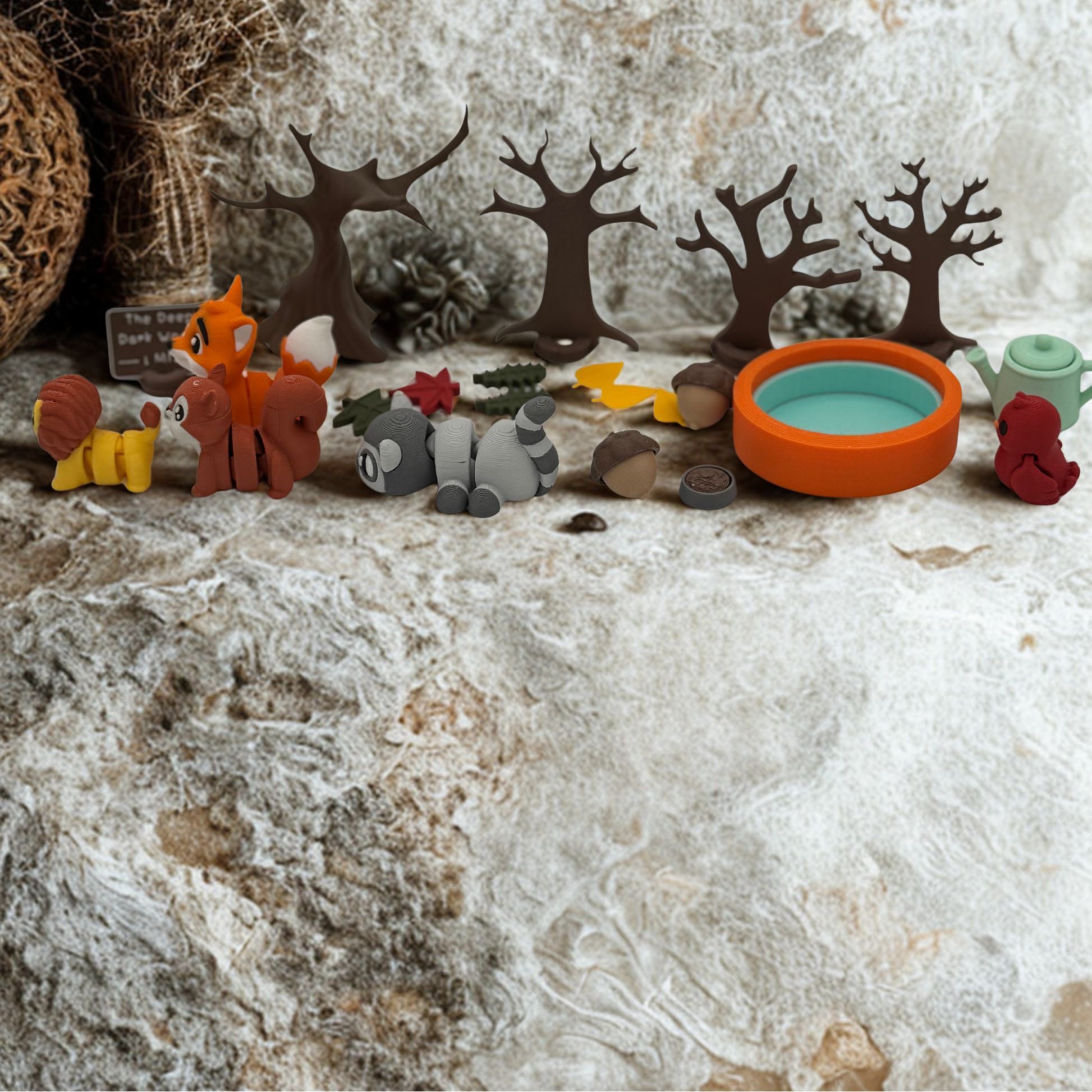 Lemur and woodland miniatures displayed in natural play scene with textured background
